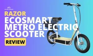 A white electric scooter with a black seat and basket is on a blue background with text "RAZOR ECOSMART METRO ELECTRIC SCOOTER REVIEW".